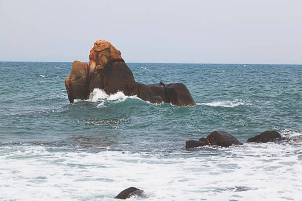 istock Rocks, sea wave and blue water 803590930