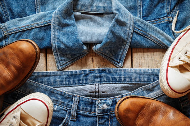 istock Clothes on wooden floor. 803592062