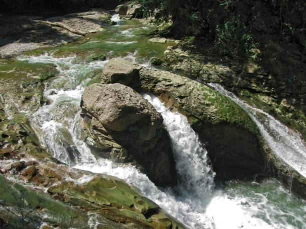 istock Waterfall between the rocks. The Caucasus nature 803599692