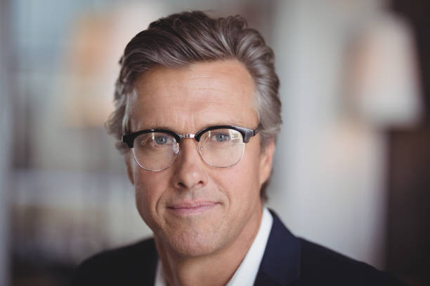 istock Businessman in spectacle at restaurant 803609540