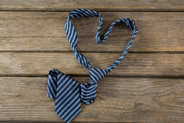 istock Overhead view of neckties in heart shape 803632068