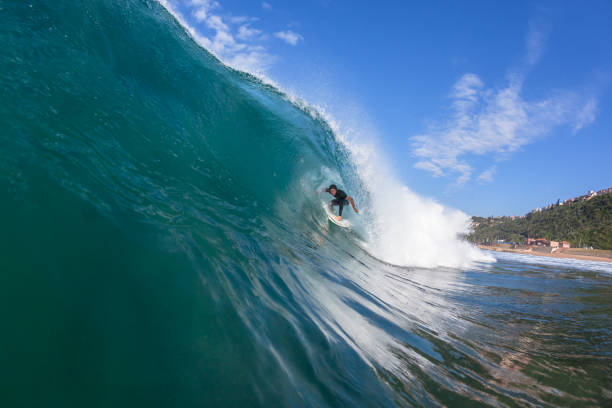 istock Surfing Surfer Tube Ride 803636798
