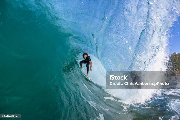 Surfing Surfer Tube Ride Stock Photo - Download Image Now - Surfing, Tube, Wave - Water