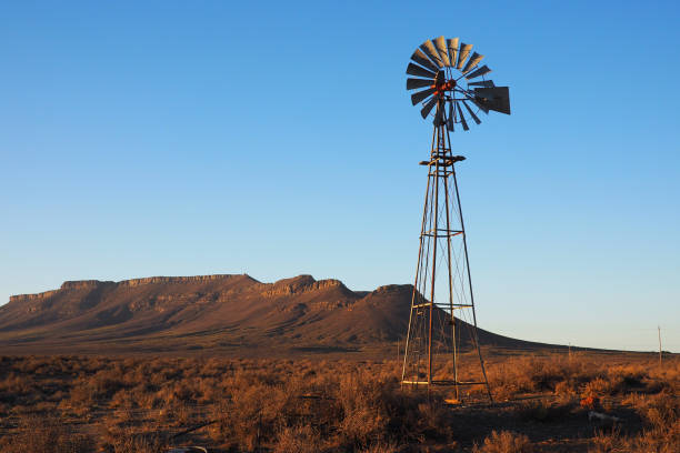 istock Wind pump on a farm in South Africa 803639722