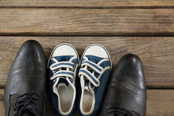 istock Overhead view of shoes on table 803644174