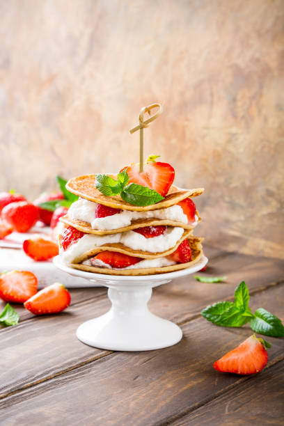 istock Pancakes cake with yogurt and strawberries 803654536