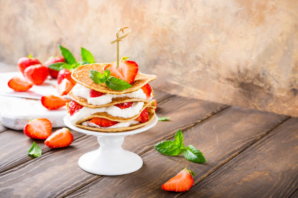 istock Pancakes cake with yogurt and strawberries 803654640