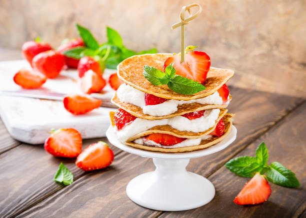 istock Pancakes cake with yogurt and strawberries 803654694
