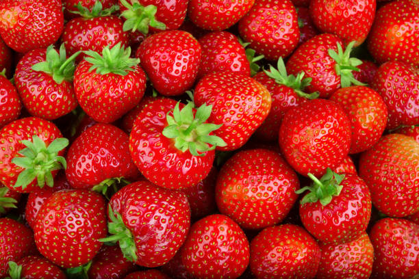 istock Strawberry. Fresh organic berries macro. Food background 803671182