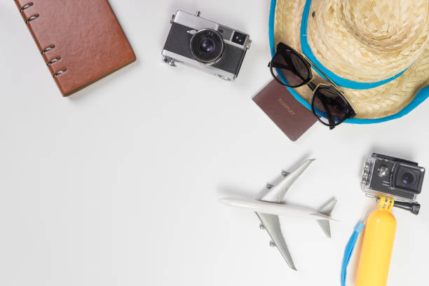 istock Summer travel accessories and gadgets on white copy space 803686534