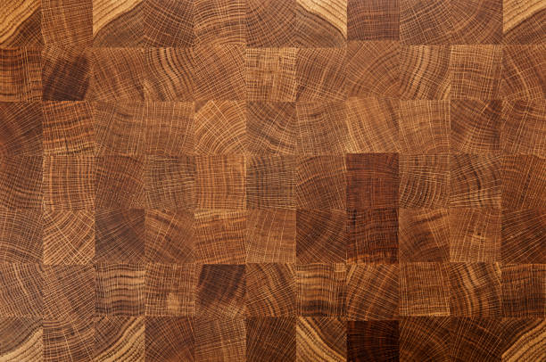 istock Oak wood butcher end grain chopping block board 803694340