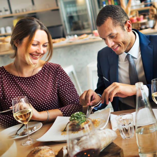 istock Couple having meal in the restaurant 803716770