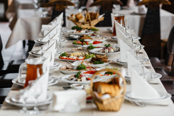 istock Photo of served festive table with dishes 803717434