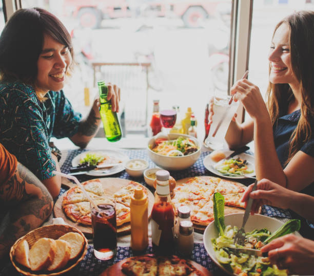 istock Friends Eating Pizza Party Together Concept 803717618