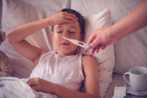 istock Sick child girl in a bed 803717710