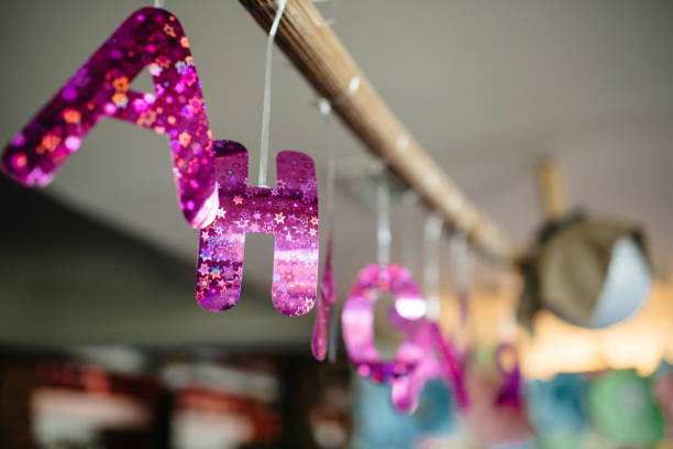 istock Name letters decoration hanging under the wall 803717726