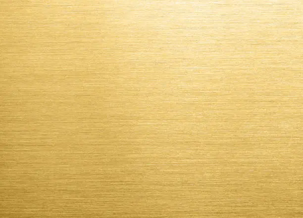 Photo of Gold brushed metal background
