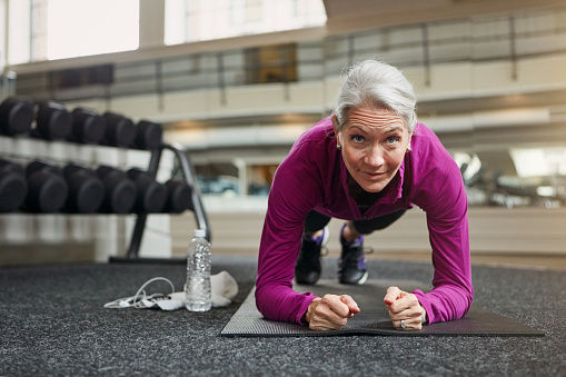 Portrait of a mature woman working out at the gym