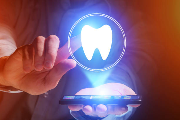 istock Concept of making an appointement with a dentist on internet - technology concept 803748702