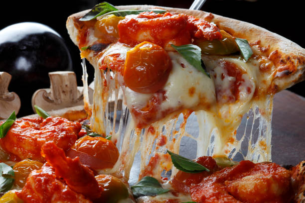 istock Slice of pizza raised 803757928