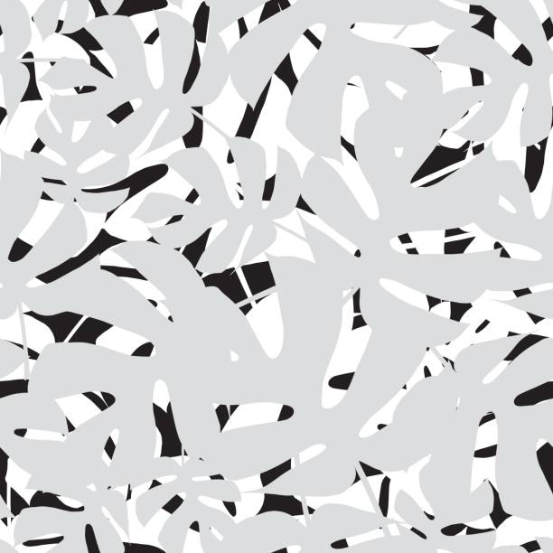 istock Seamless vector background with gray and white palm leaves on a black background. Summer tropical design. Textile rapport. 803758602