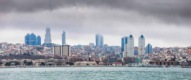 Istanbul European side skyline, view from Bosporus strait in foggy day. Panoramic montage from 2 images