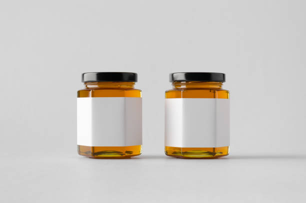 istock Honey Jar Mock-Up - Two Jars. Blank Label 803794900