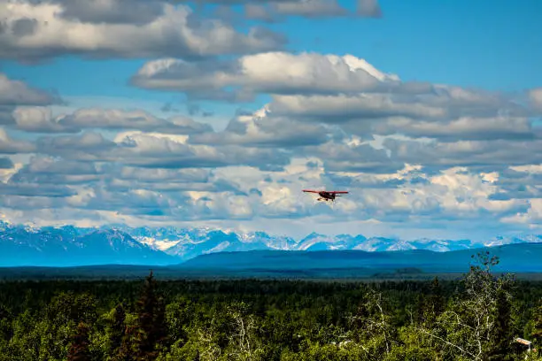 Bush plane flying over Alaska