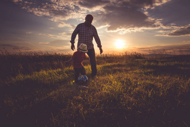 istock Playing soccer with grandpa 803843032