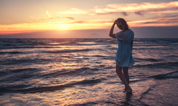 istock Watching beautiful sunset near sea 803859952