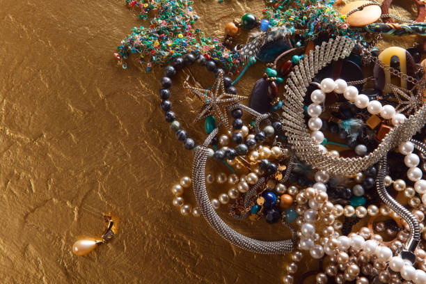istock jewelry on a gold background 803874964