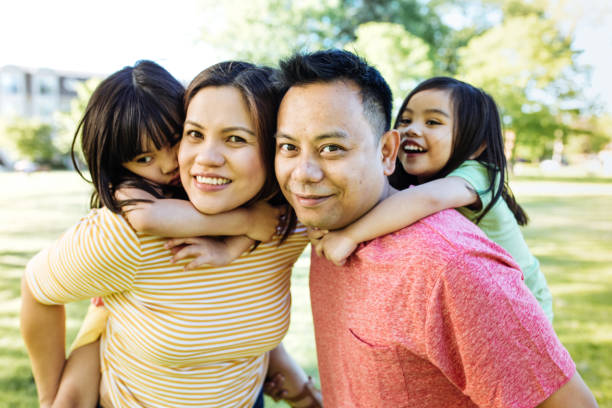 istock Happy family of four 803875824