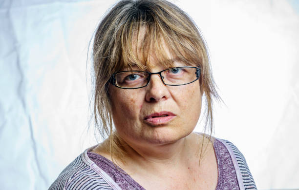 istock Mature woman studio portrait 803878120
