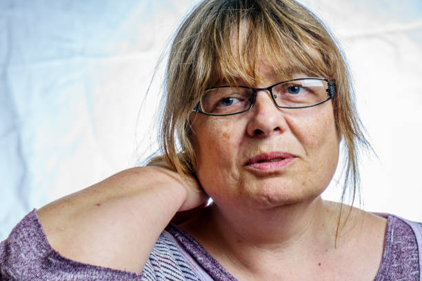 istock Mature woman studio portrait 803878524