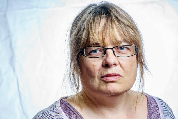 istock Mature woman studio portrait 803878674