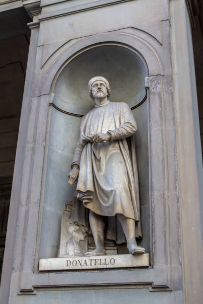 Statue of Donatello, Florence, Italy Statue of Donatello outside the Uffizi Museum in Florence, Italy donatello italian sculptor stock pictures, royalty-free photos & images