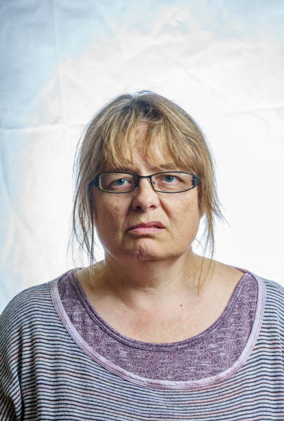 istock Mature woman studio portrait 803881882