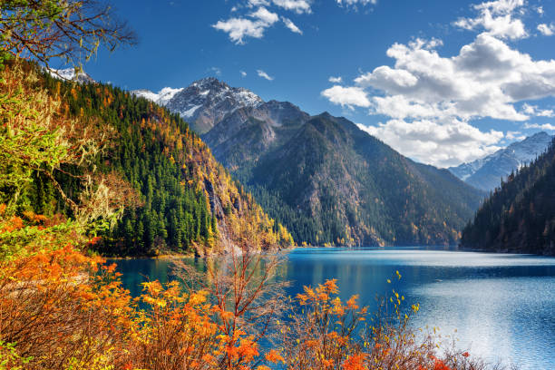 istock Fantastic view of the Long Lake among mountains and fall woods 803887604