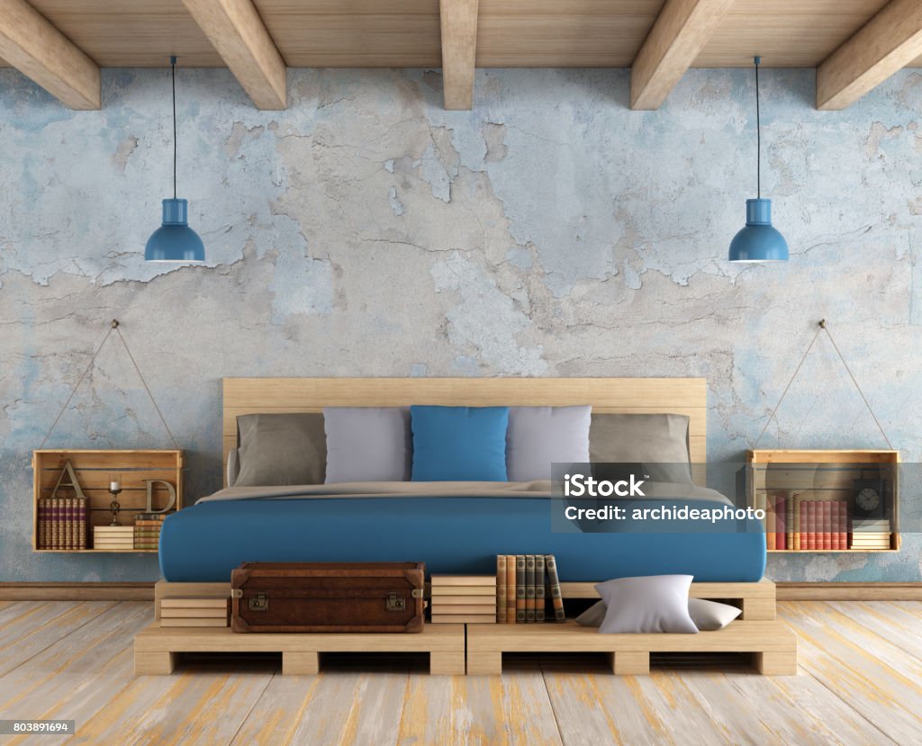 Master bedroom in a grunge room Master bedroom with pallet double bed ,old wall and wooden ceiling - 3d rendering
 Bedroom Stock Photo