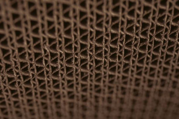 istock Macro texture of cardboard. Cardboard corrugated pattern. Abstract texture and background for designers. Brown paper texture and pattern. Closeup view of cardboard background. 803892074