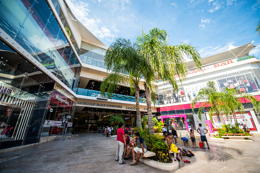 Playa Del Carmen, Mexico - December 27, 2016: People shopping and resting at shopping mall on famous 5th Avenue, shopping street on Playa del Carmen