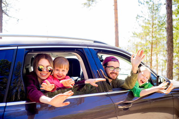 istock Family in a car 803905396