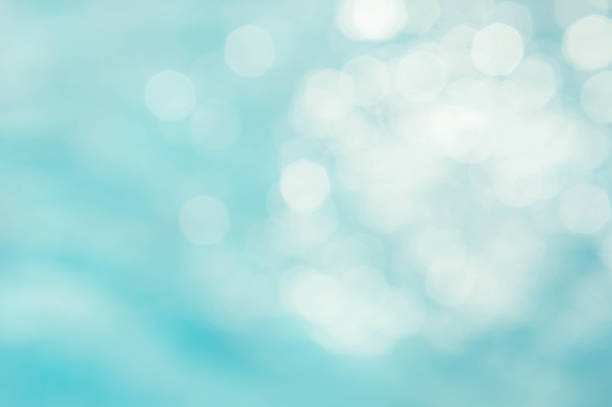 istock abstract green blue blur backgruond , wallpaper blue wave with sunlight bokeh texture background 803930918