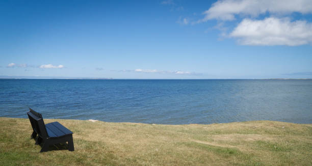 istock Lonely bench in Havre-Aubert, Quebec 803933986