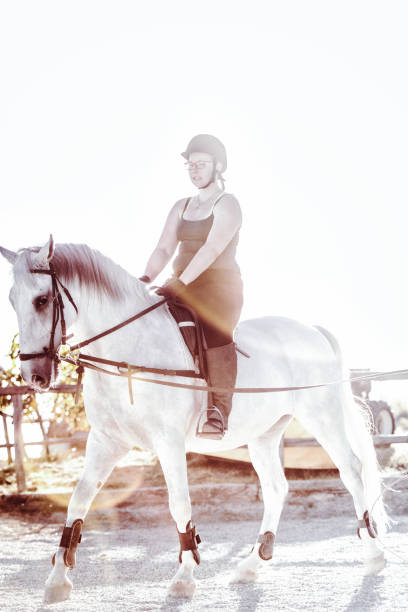 Horsewoman in a manege