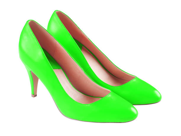 istock Spike light green leather high heels isolated on white 803944184
