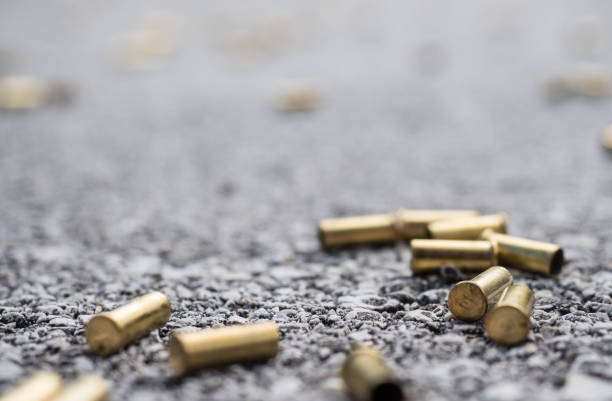 Bullet casings Bullet casings on the street bullet cartridge photos stock pictures, royalty-free photos & images
