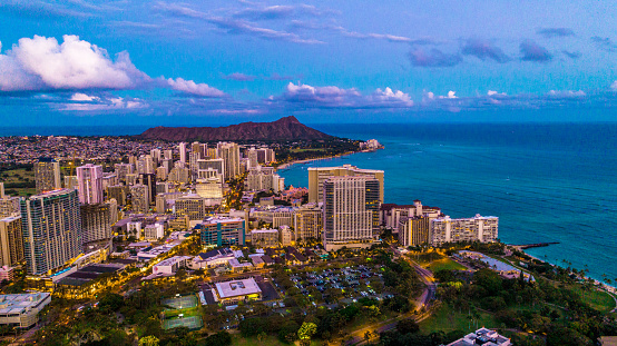 Aerial view of Waikiki cityscape at night, Hawaii, United States