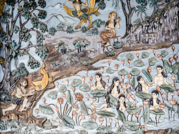 istock Ancient mural carvings in Wat Mahathat facade Luang Prabang Laos 803971886