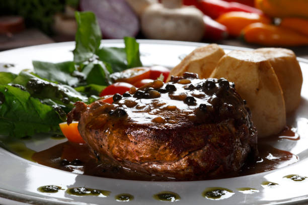 istock Roasted filet mignon with salad 803972718